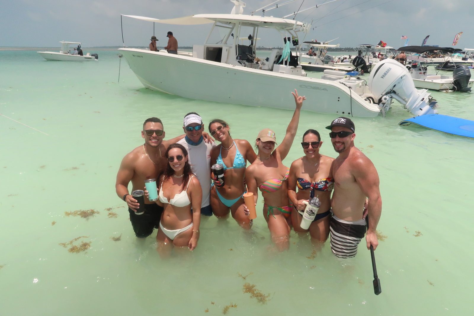 Group of friends standing at the Islamorada sandbar