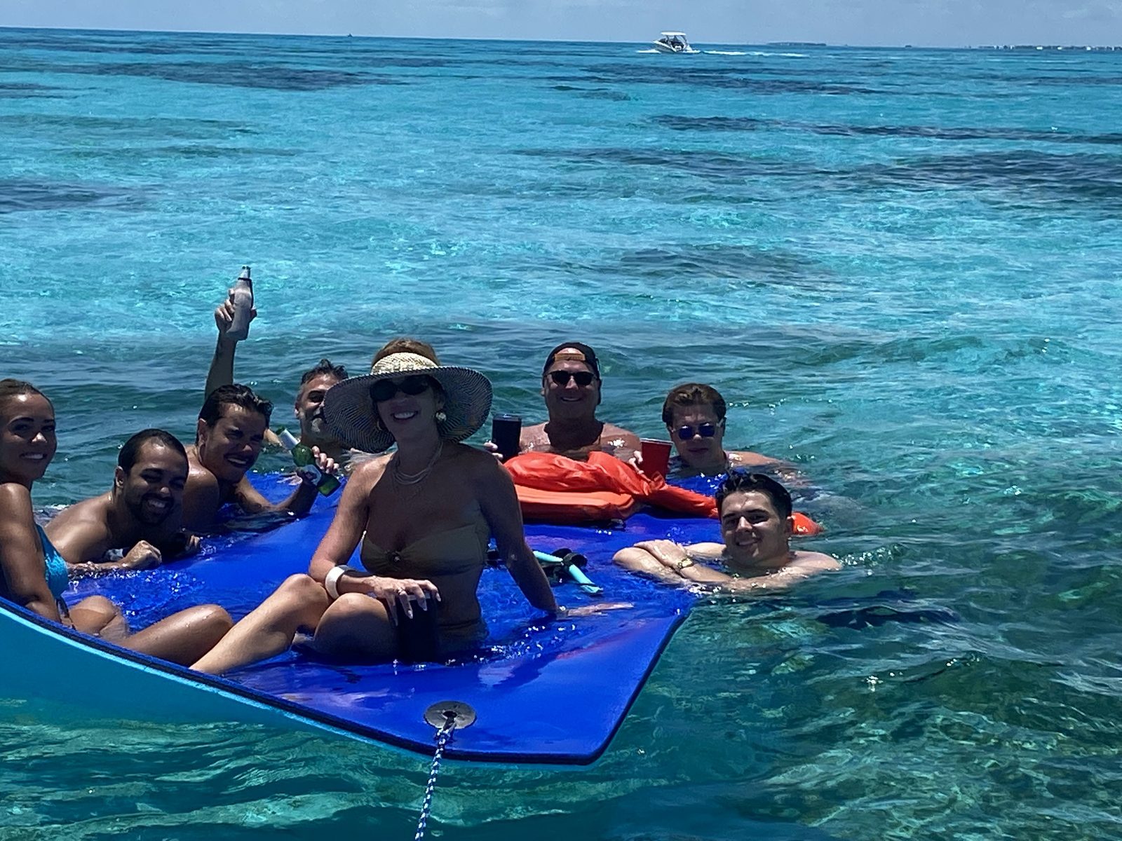 Group enjoying a water mat at the Islamorada sandbar